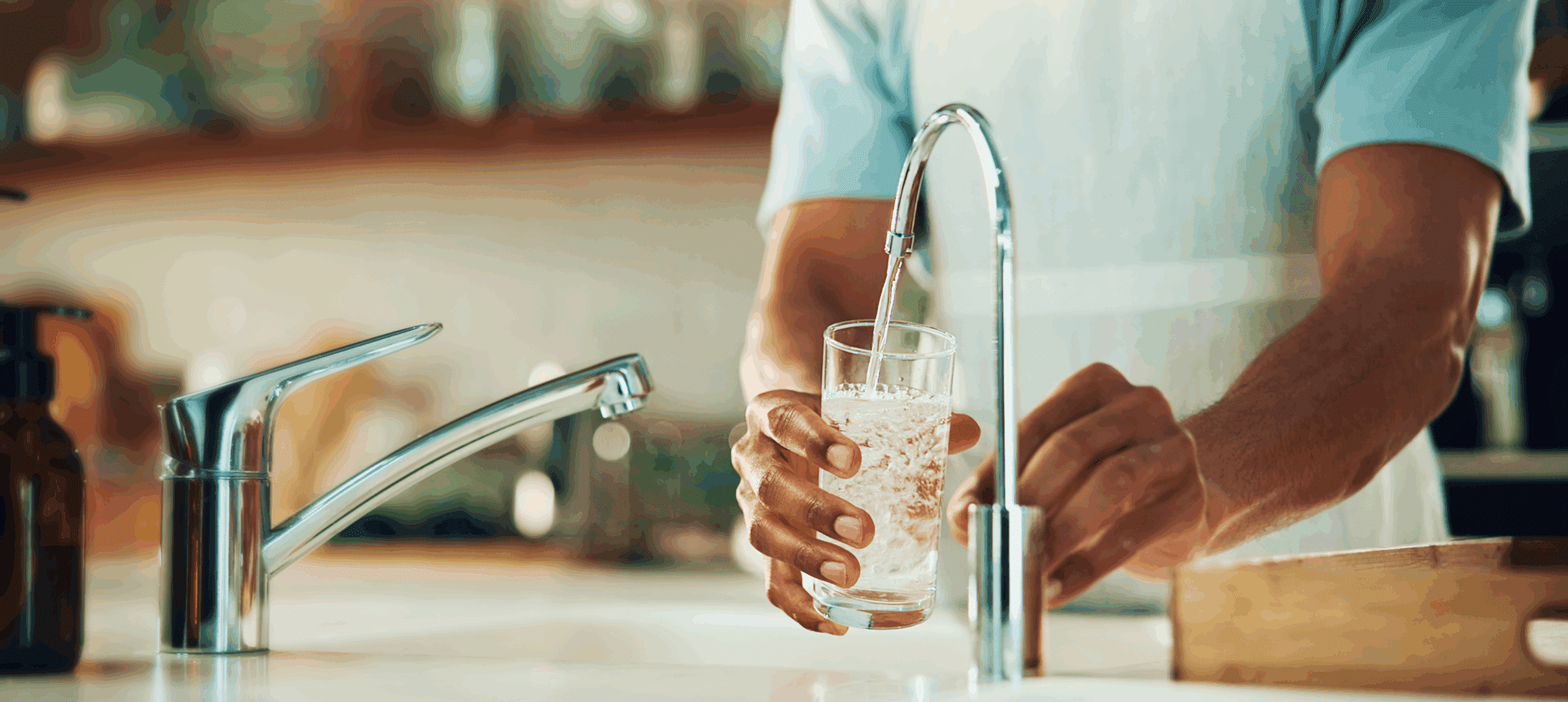 Filling a glass with water